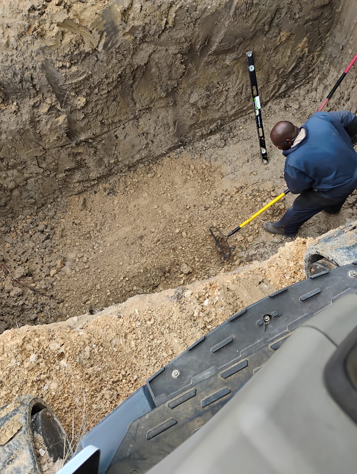 Soil evaluation and excavation for septic system site assessment by Enviro-Pal